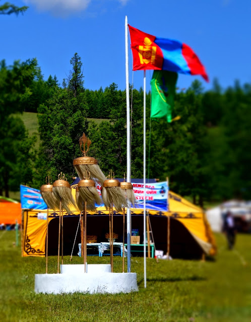 It might be on a smaller scale, but all local Naadam events still proudly display the Mongolian flag and banner. Khatgal Naadam, Khovsgol Mongolian flag and banner at the Khatgal Naadam, Khovsgo