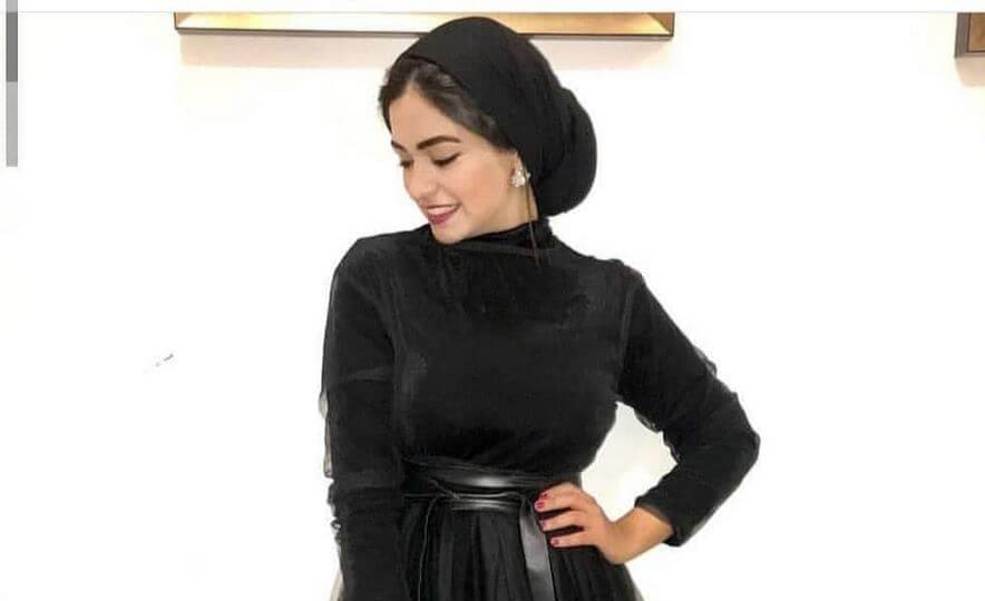 فستان سهرة باللون الاسود للمحجبات A black evening dress for veiled women