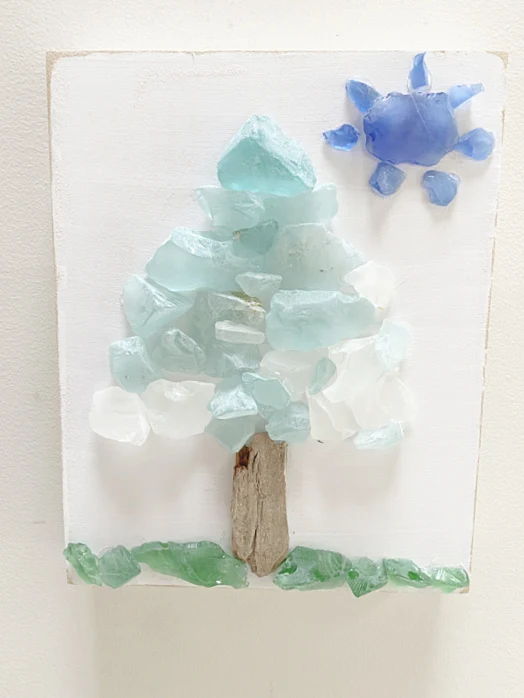 sea glass tree with sun and grass