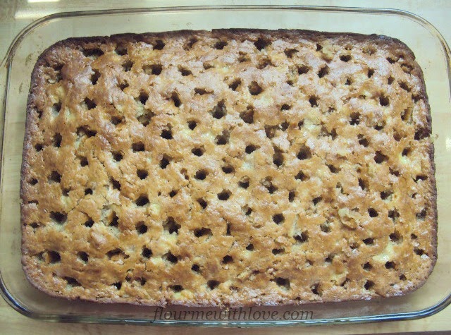 Scratch ingredients turned into a delicious moist Banana Toffee Poke Cake with Browned Butter Frosting