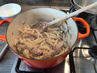 Naughty Pasta cooking within the Le Creuset saucepan