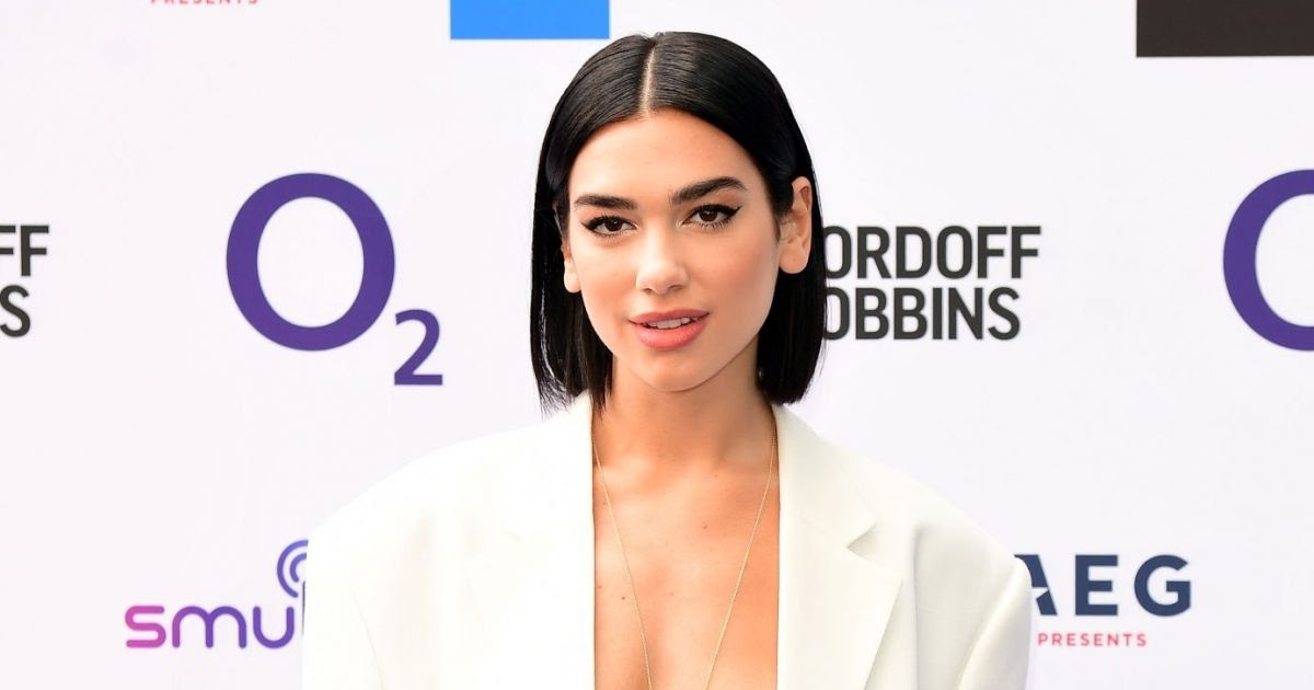 Dua Lipa puts toned midriff on show at the O2 Silver Cleff Awards in London
