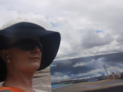 Plein air oil painting and photo of the artist Jane Bennett on the Barangaroo construction site in 2010