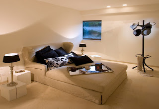 Assorted Modern Sofa Bed for Various Modern Rooms Modern Sofa Bed with Dark Cushions and Pillows near the White Side Tables and Black Shaded Table Lamps