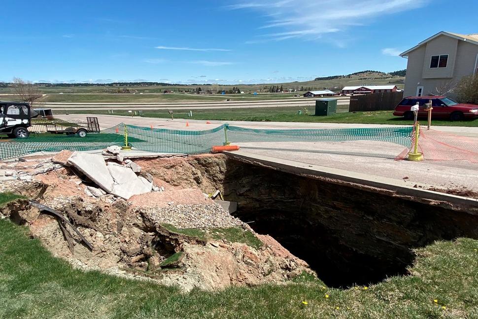 Sciency Thoughts Families evacuated after sinkhole opens near homes in