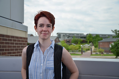 woman in front of UACCM campus