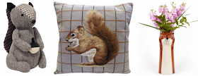 Squirrel doorstop, a squirrel cushion and a fox vase