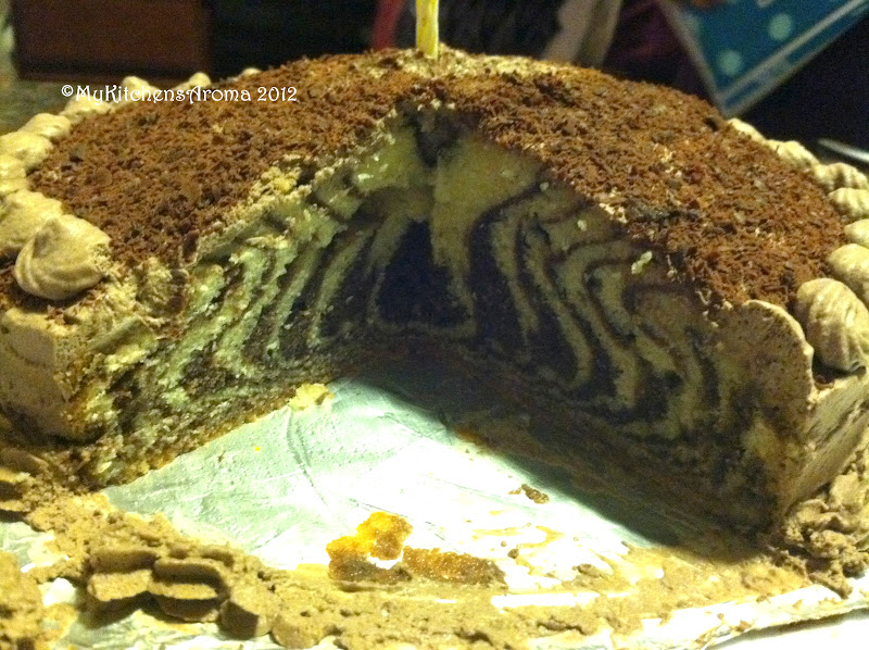 The Sizzling Pan "Pat a Cake" Zebra Cake with Chocolate Whipped Cream frosting