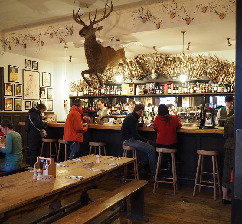 The Flying Stag hanging over the bar at the Fife Arms