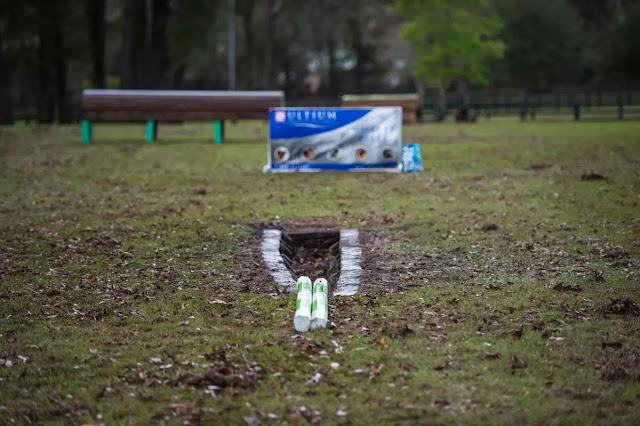 Show jump poles parallel to ditch