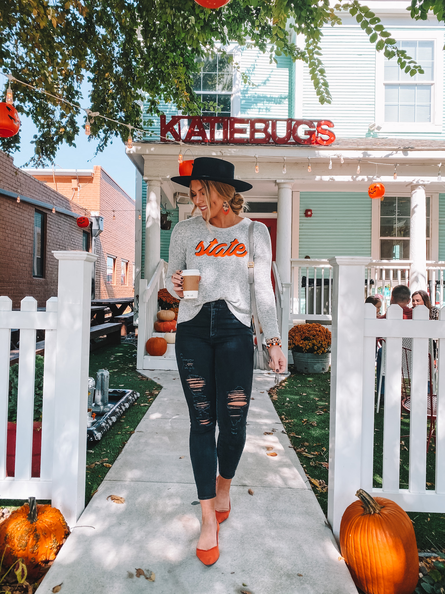 Blogger Amanda Martin getting a coffee and a cookie from Katiebug's in Automobile Alley, OKC