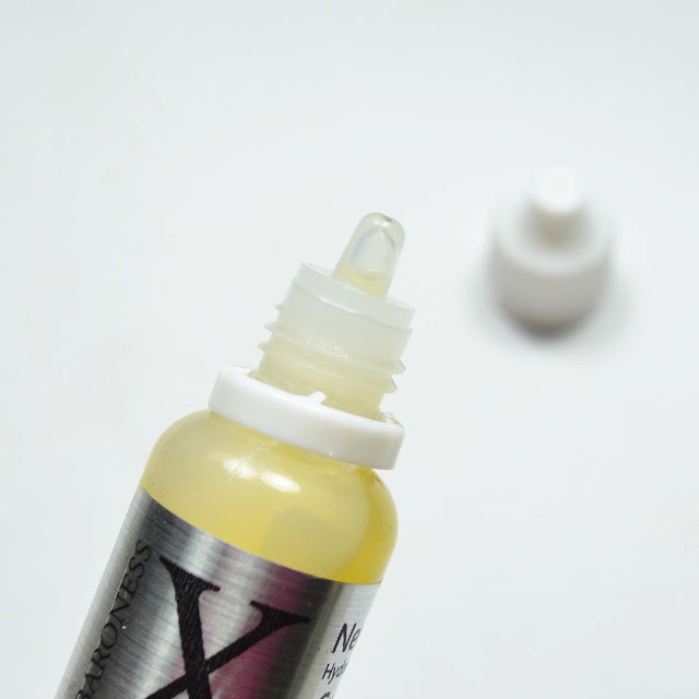 sol cheirosa '62 scented cuticle oil in a dropper bottle with the dropper tip displayed