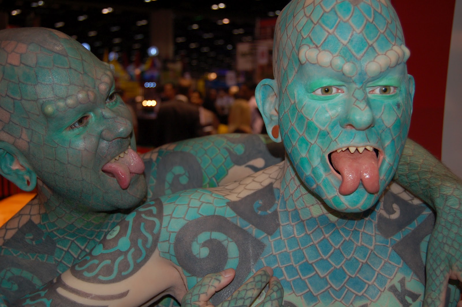 10. Eric Sprague, also known as "The Lizardman", has a full-body tattoo of green scales and has had his teeth filed into sharp points. - wide 9
