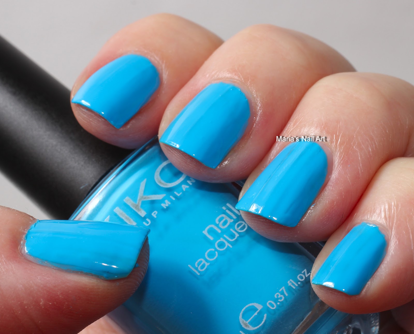10. Kiko Milano Nail Lacquer in "Turquoise Blue" - wide 6