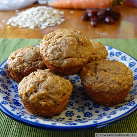 a plate of carrot cake whole grain muffins made with dates, raisins, honey and maple syrup for sweetness.