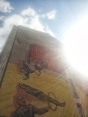 Street art work Staged wall on Karl Marx Strasse in Neukolln Berlin