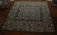 De antieke quilt - beter bekend in huis als de slingerrandjesdeken