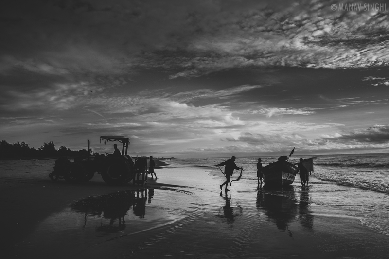 Fisherman bringing there boat back to shore at Fisherman Area near Le Pondy Beach Resort, Pondicherry- 31-Oct-2019