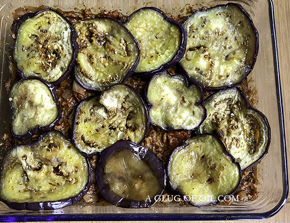 Layering moussaka with eggplant