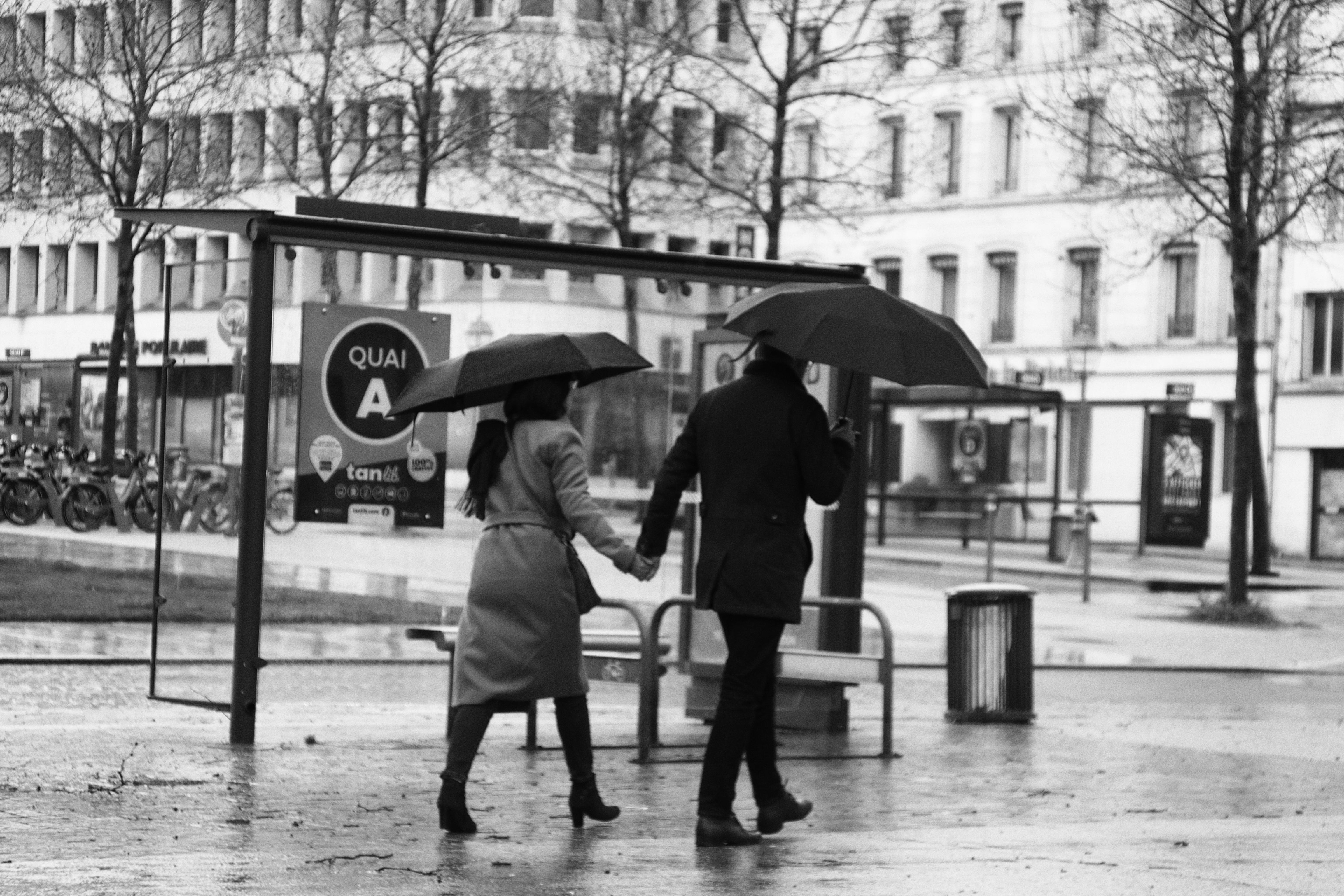 couple under rain | full image