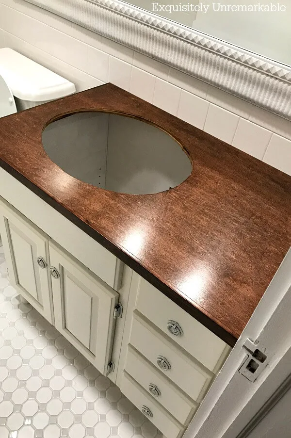 DIY Wooden Countertop without a sink and off white vanity in bathroom