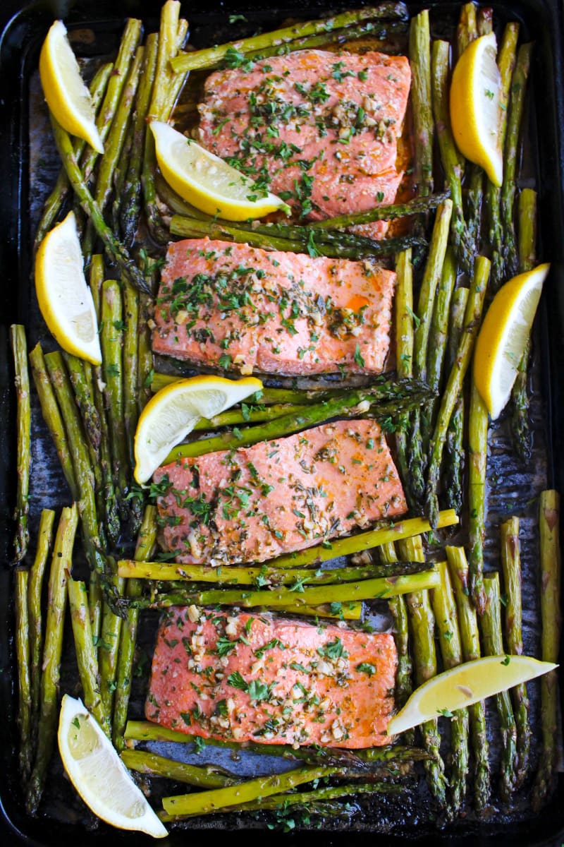 Top view of Lemon Butter Salmon and Asparagus on a sheet pan.