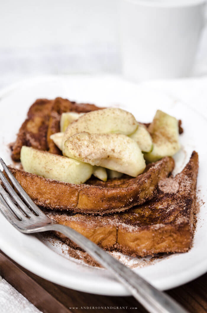 Best tasting fall breakfast ever - Cinnamon crusted french toast topped with caramelized apples.