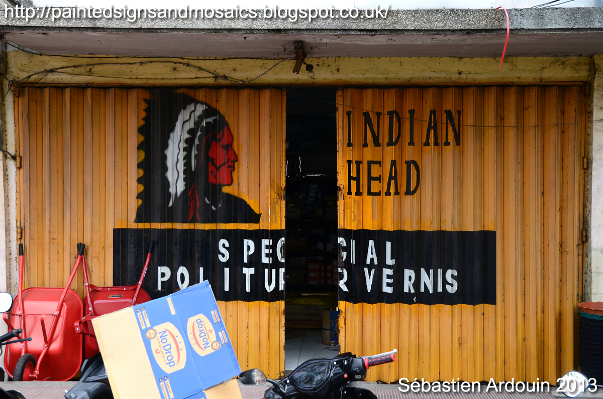 Painted signs and mosaics: Indian Head, Singaraja, Indonesia