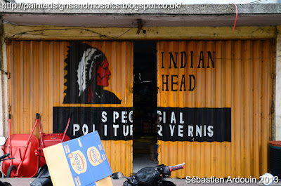 Painted signs and mosaics: Indian Head, Singaraja, Indonesia