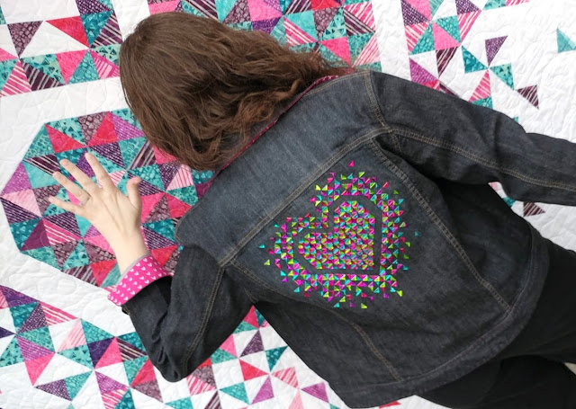 Right triangle hot-fix crystals on an upcycled denim jacket following the Exploding Heart quilt pattern by Slice of Pi Quilts