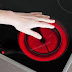How does the body respond to touching something hot?