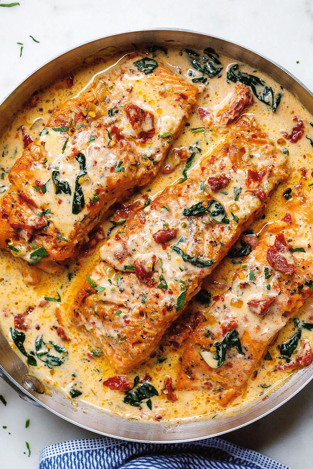 How to Make Creamy Garlic Tuscan Salmon With Spinach and Sun-Dried Tomatoes