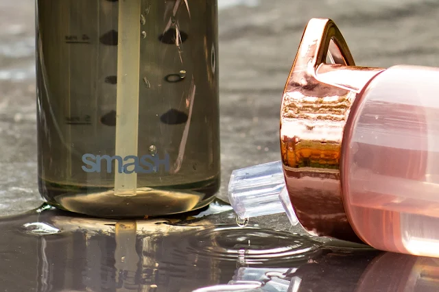 Close up of SMASH water bottles showing drinking spout