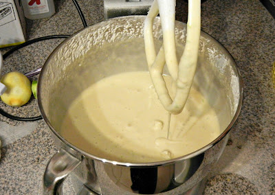 a stand mixer with cake batter 