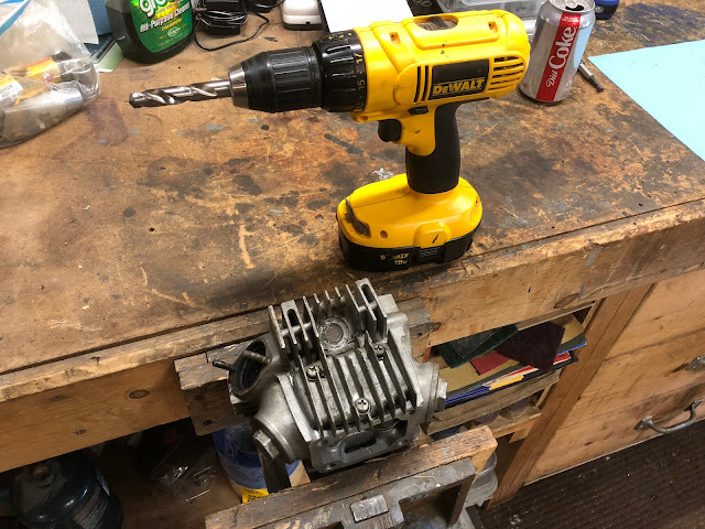 CT90 repair of stripped spark plug hole threads Drilling out CT90 cylinder head for thread repair