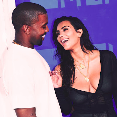 Kim Kadarshian candid with Kanye West