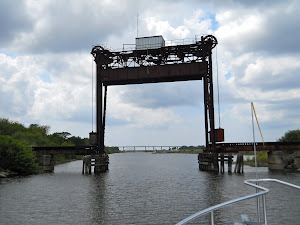 It only looks like a guillotine!  It's a railroad lift bridge.  Scary to go under!