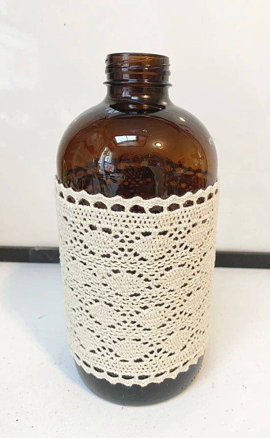 lace wrapped amber bottle