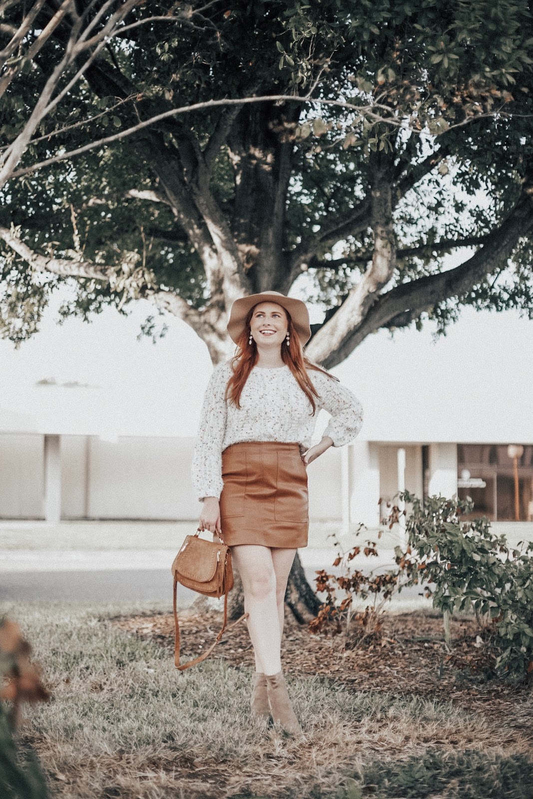 25+ Affordable Sweaters To Wear With Faux Leather Skirts | Affordable by Amanda, a Style Blog by Tampa Blogger Amanda Burrows | Faux Leather Miniskirt Style for Less