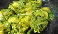 Cooking chicken green color chicken pieces for chicken cafreal recipe