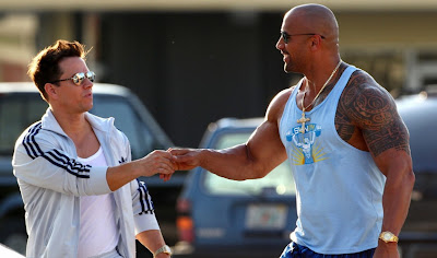 Mark Wahlberg and Dwayne Johnson star in PAIN & GAIN