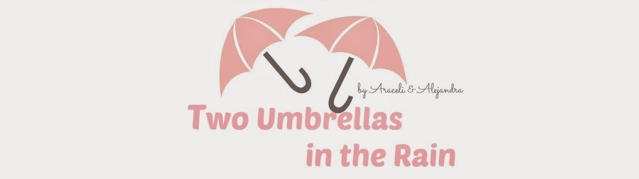 Two umbrellas in the rain