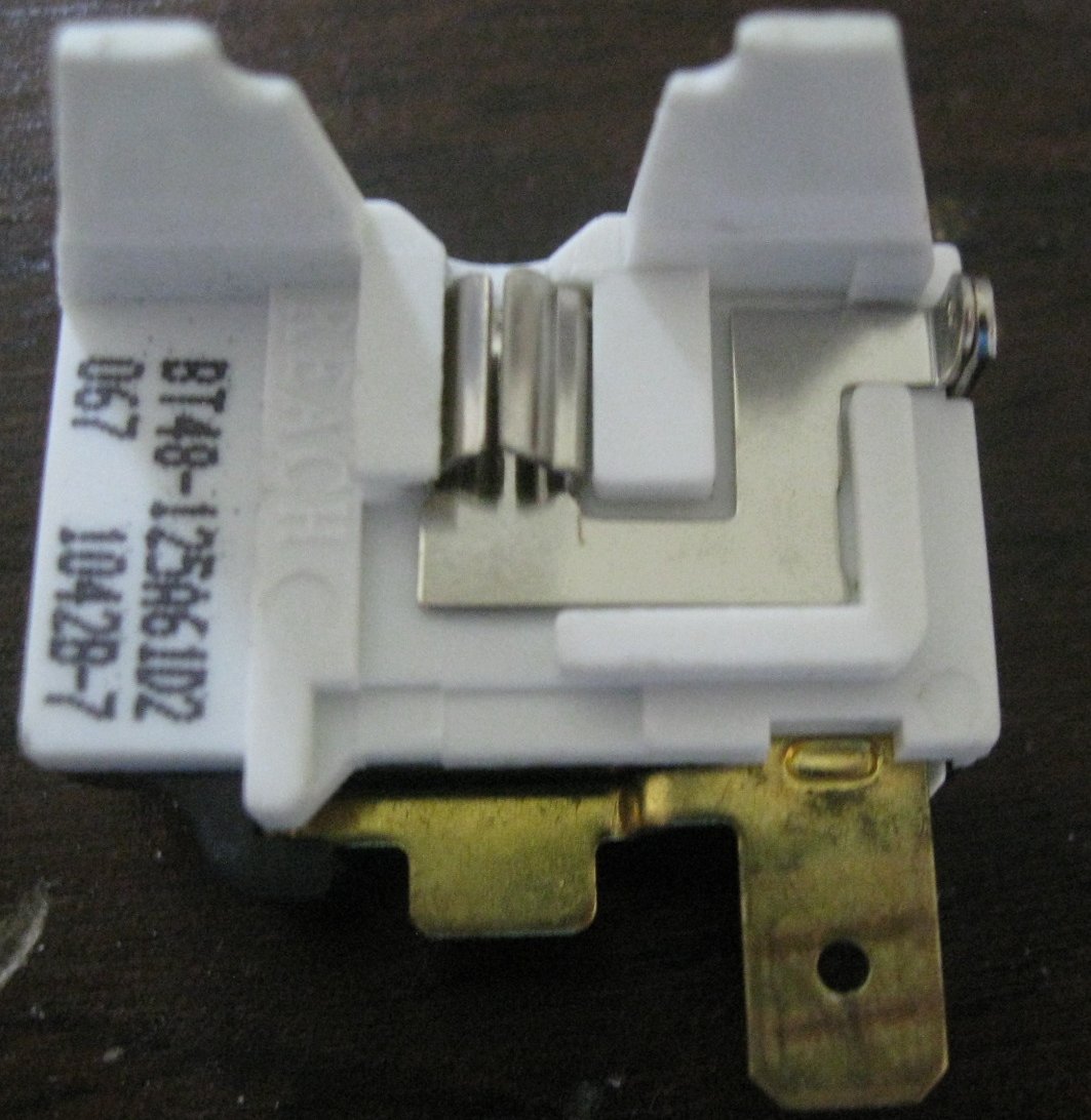 Little Tinker Fixing an Emerson mini refrigerator