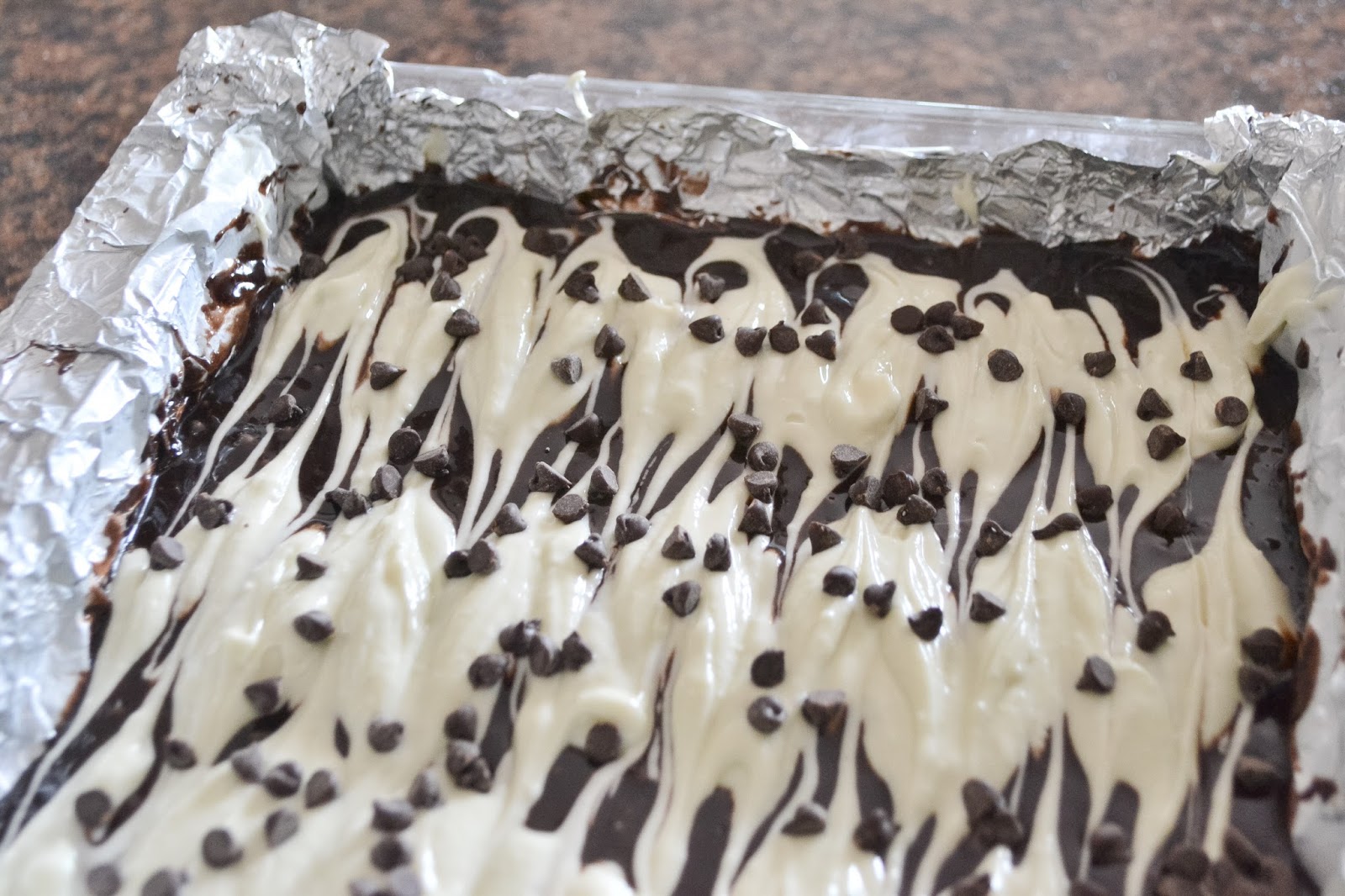 Cast Iron Stew Cheesecake Brownies