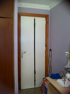 Cosas que pasan: Colgador de bolsos para puertas