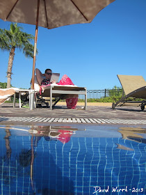 relaxing by the pool, mexico all inclusive resort