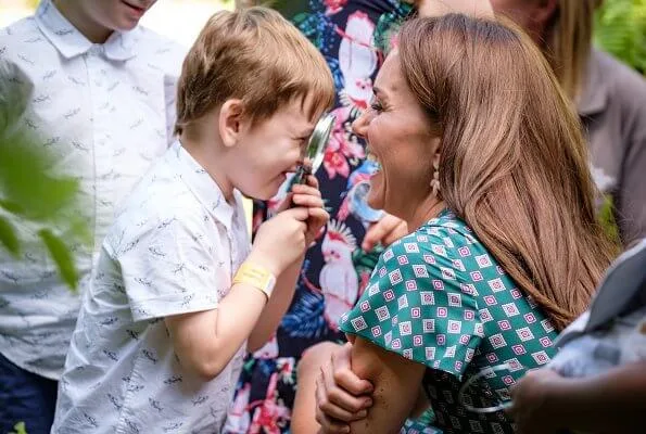 Kate Middleton wore a short sleeved printed dress by Sandro, Castaner Carina wedge, Accessorize polly petal drop earrings