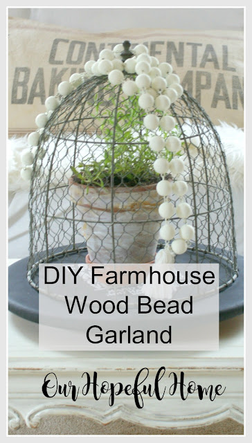 DIY Farmhouse Wood Bead Garland wire cloche wood bead garland tassel lazy susan