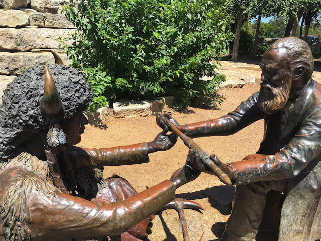 a statue honoring the unbroken treaty between the German pioneers and the local Native American tribes in Fredericksburg, Texas