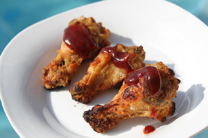 these are baked chicken legs with barbecue sauce on top